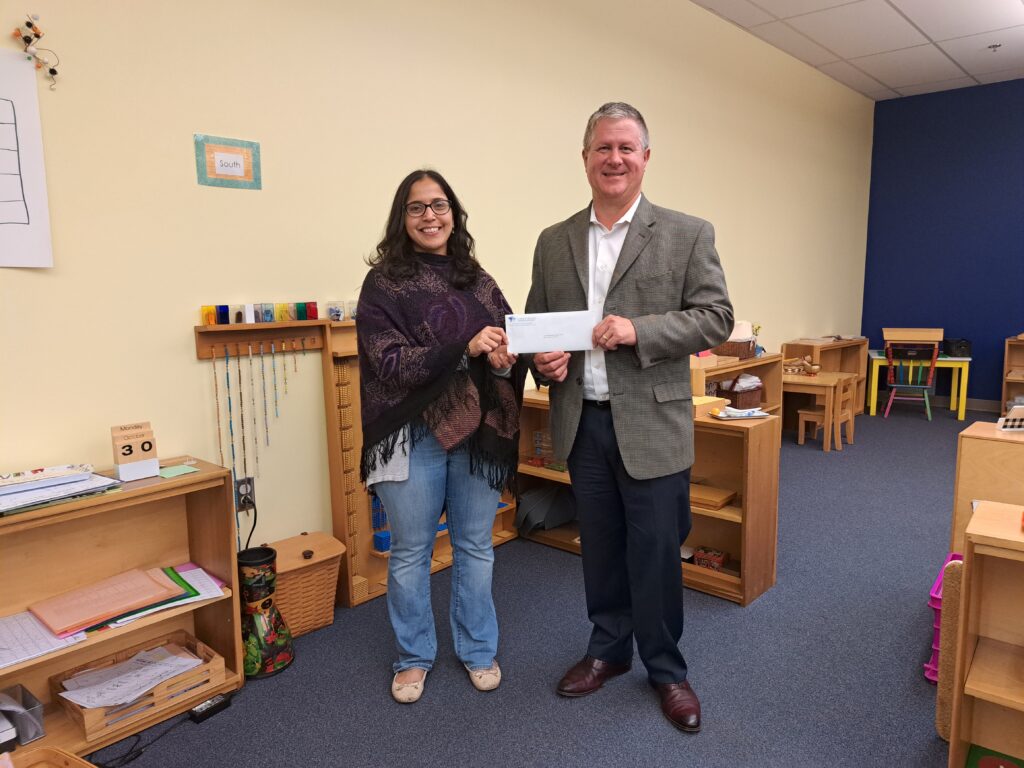 radhika and brian hold a eitc award