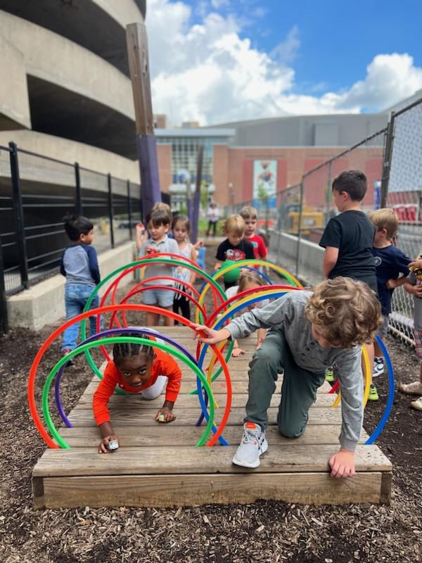 Kids playing on playground at Grace Montessori School