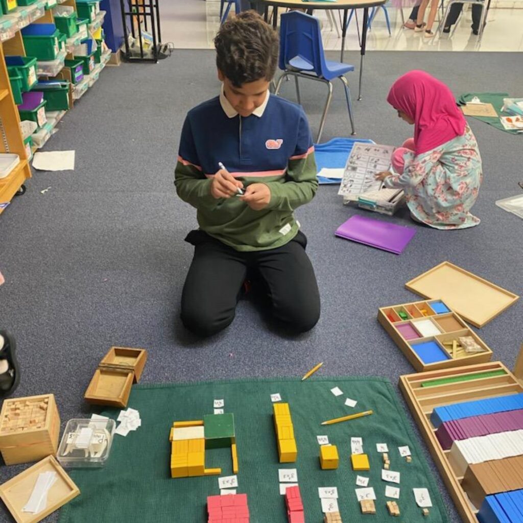 Student working on a project in a quiet classroom